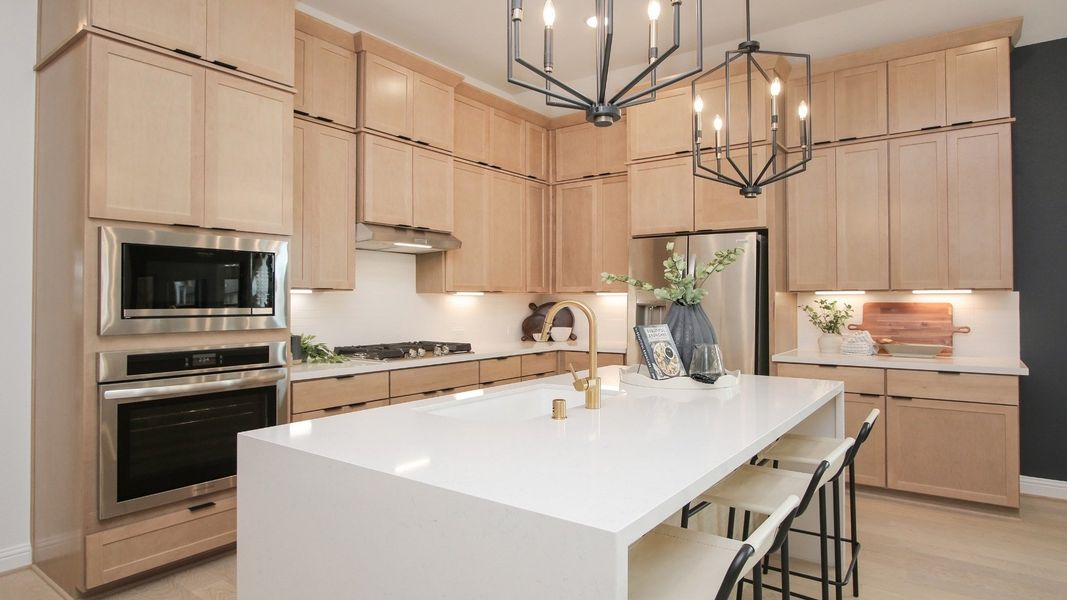 Representative furnished interior of a home built from the Willow by Brightland Homes in Sunterra, Katy (Image 5).