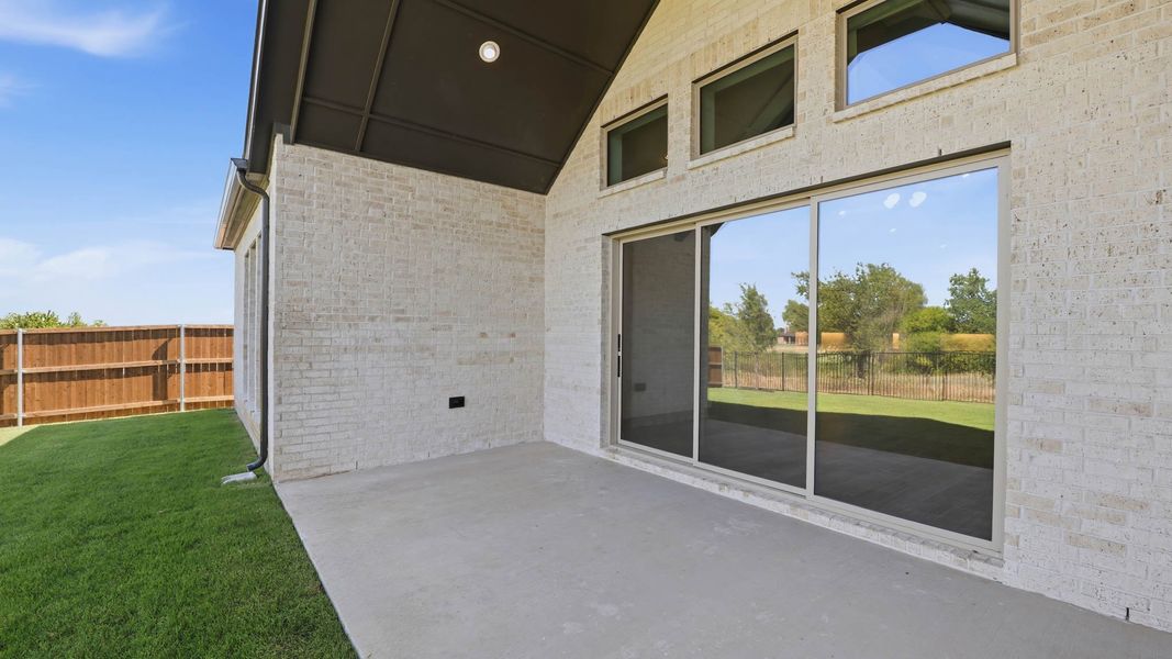 Exterior details and patio area of a home in Sweetgrass, Haslet (Image 3).
