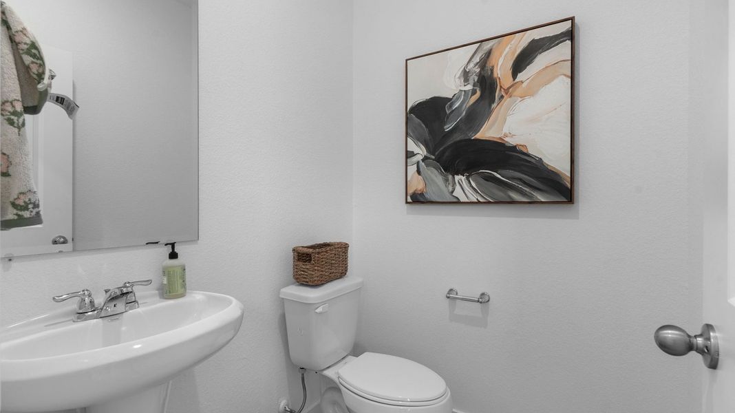 Furnished interior view inside a new home in Caldwell Crossing, Iowa Colony (Image 7).
