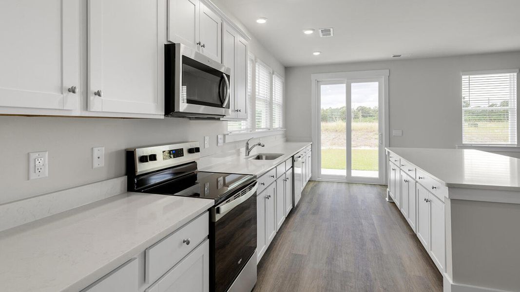 Furnished interior view inside a new home in Surfside Landing, Hubert (Image 7).