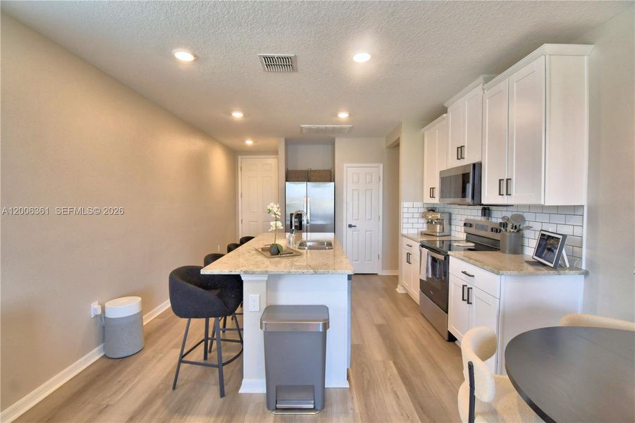 Furnished interior view inside a new home in Lake Deer Estates - Classic Series, Kissimmee (Image 19).