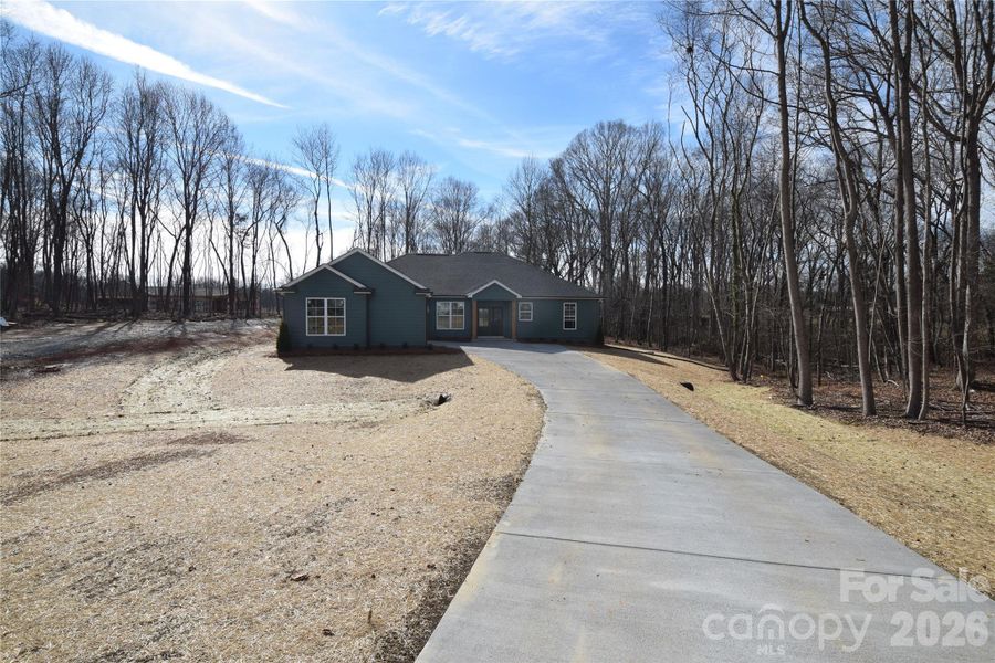 Front exterior of a new home in , Monroe, NC, highlighting curb appeal (Image 1). Front exterior of a new home in , Monroe, NC, highlighting curb appeal (Image 1).