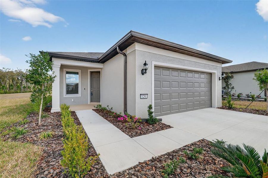 Front exterior of a new home in , Ocala, FL, highlighting curb appeal (Image 24).