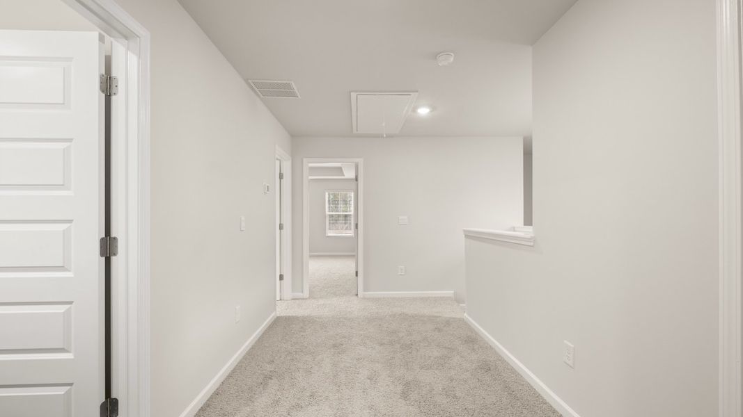 Representative unfurnished interior of a home built from the Ashmore by D.R. Horton in Brookland Commons, Monroe (Image 26).