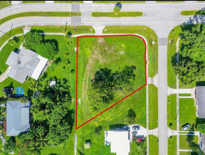 Front exterior of a new home in Gatlin, Port St. Lucie, FL, highlighting curb appeal (Image 22). Front exterior of a new home in Gatlin, Port St. Lucie, FL, highlighting curb appeal (Image 22).