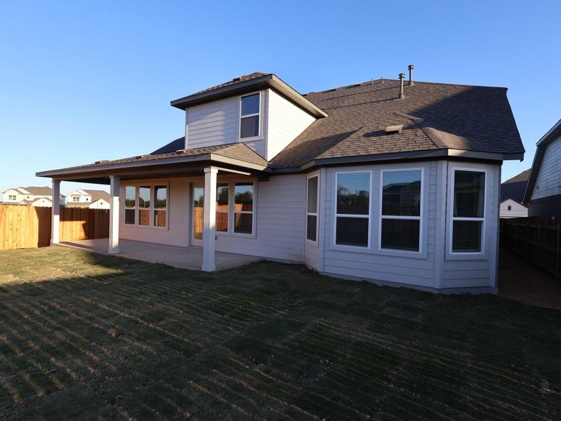 Exterior details and patio area of a home in Edgewood, Leander (Image 2). Exterior details and patio area of a home in Edgewood, Leander (Image 2).