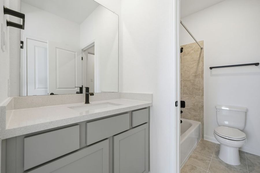 Furnished interior view inside a new home in Parkside on the River, Georgetown (Image 7).