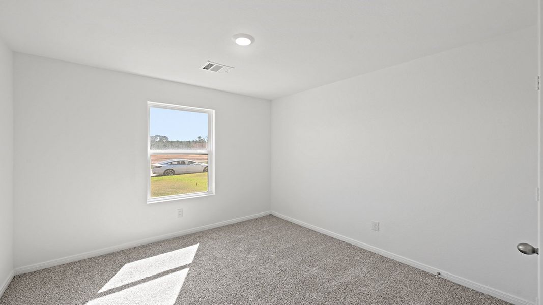 Spacious, unfurnished interior of a new home in McCrorey Trails, Conroe (Image 9).
