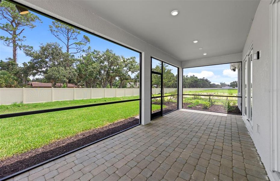 Exterior details and patio area of a home in Legacy Groves, Nokomis (Image 3).