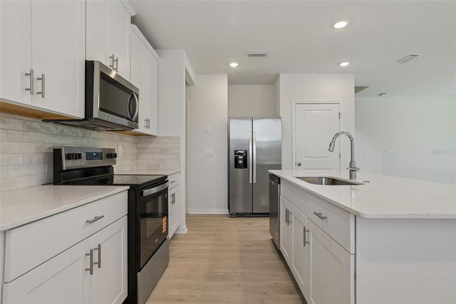 Furnished interior view inside a new home in Bradford Park, Ormond Beach (Image 11).