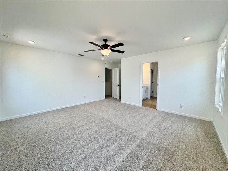 Spacious, unfurnished interior of a new home in Eastlyn Crossing, Flowery Branch (Image 15).