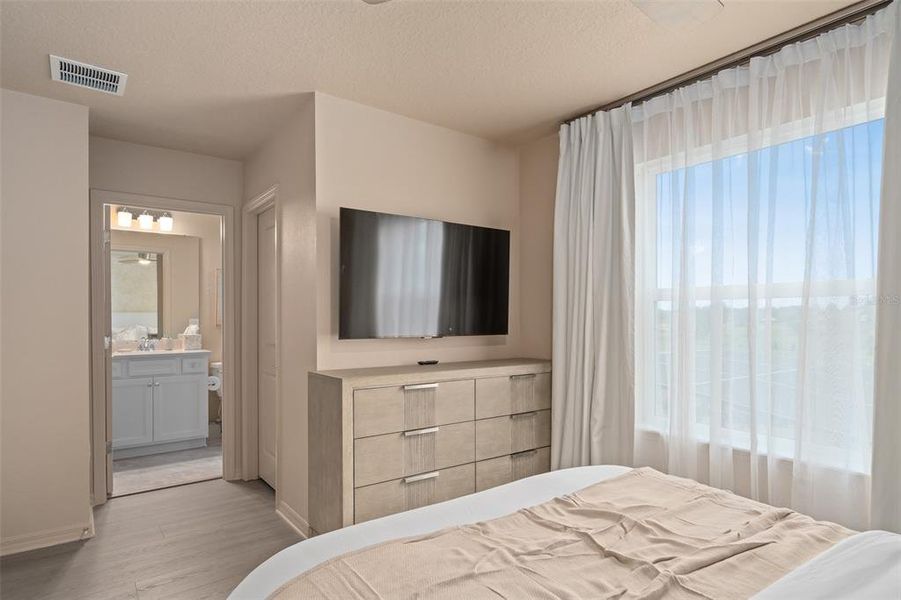 Furnished interior view inside a new home in Windsor Cay Resort, Clermont (Image 43).