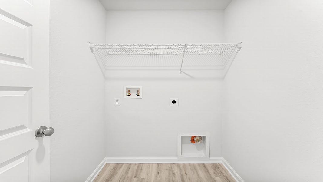 Representative furnished interior of a home built from the The Aisle by D.R. Horton in Titus Park, Panama City (Image 11).