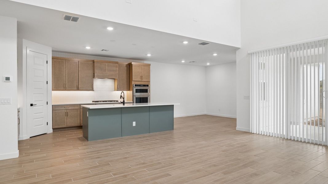 Representative furnished interior of a home built from the Phoenician by D.R. Horton in The Ridge at Stone Butte, Phoenix (Image 7).