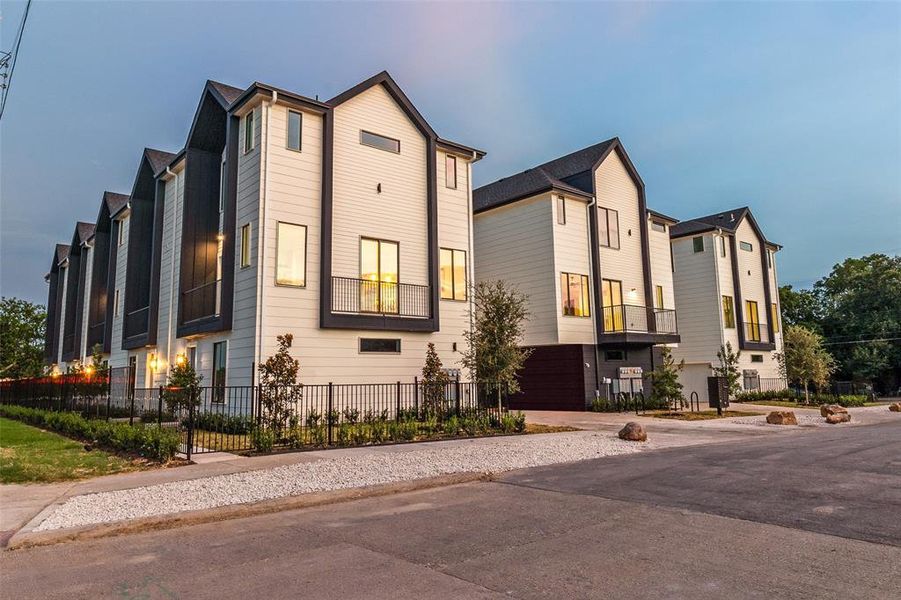 Front exterior of a new home in , Dallas, TX, highlighting curb appeal (Image 26). Front exterior of a new home in , Dallas, TX, highlighting curb appeal (Image 26).