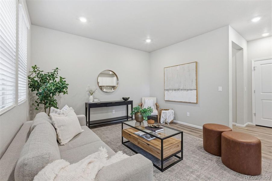 Furnished interior view inside a new home in Woodrose at Painted Prairie, Aurora (Image 13).