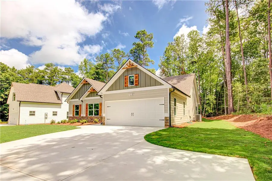 Front exterior of a new home in , Villa Rica, GA, highlighting curb appeal (Image 23).