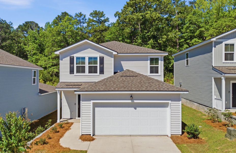 Front exterior of a new home in Grand Arbor, Blythewood, SC, highlighting curb appeal (Image 16).