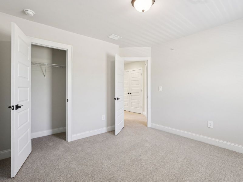 Spacious, unfurnished interior of a new home in Hemingway - Highland Series, Cumming (Image 17). Spacious, unfurnished interior of a new home in Hemingway - Highland Series, Cumming (Image 17).