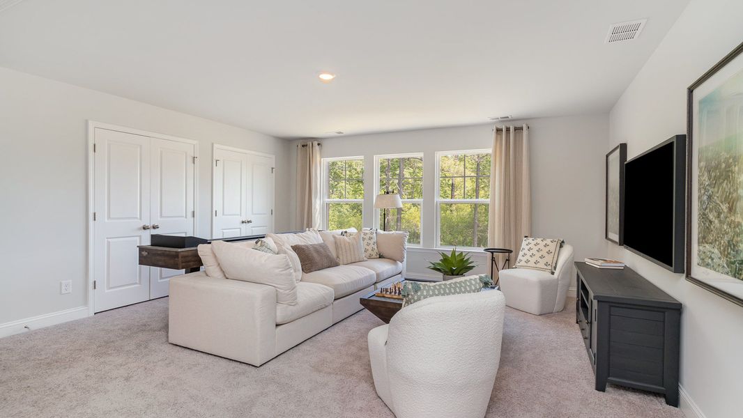 Representative furnished interior of a home built from the HARBOR OAK by D.R. Horton in Spring View Landing, Loris (Image 14).