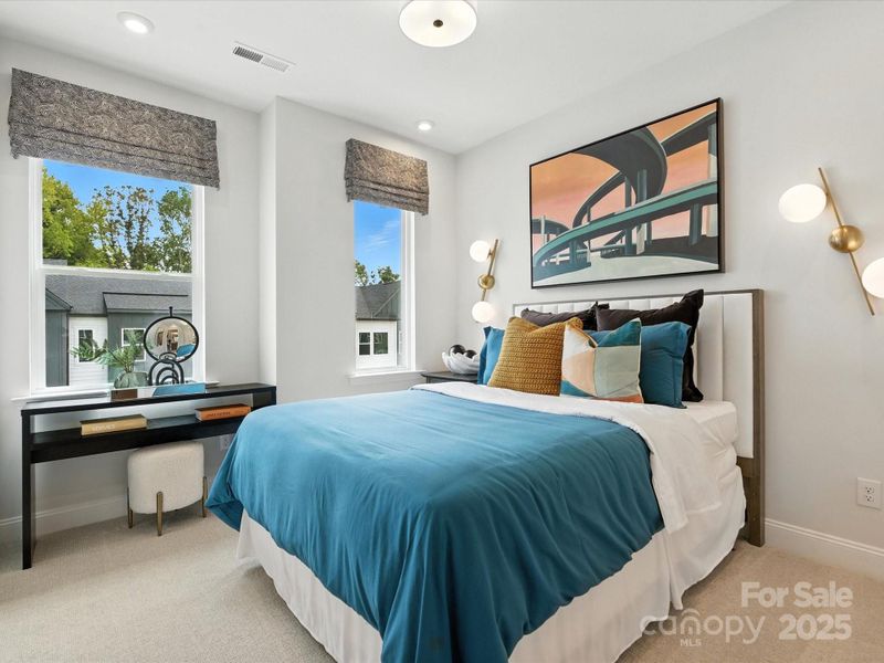 Bedroom 3 With 9' Ceilings and Large Windows. *Model Photos | Actual Finishes, Structural Selection, and Orientation May Vary.