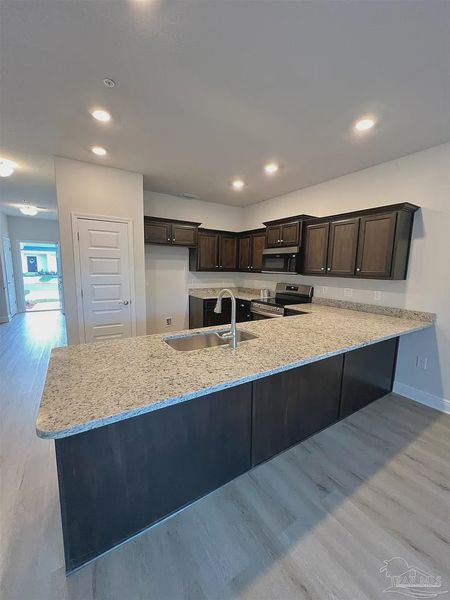 Furnished interior view inside a new home in Lexlee Estates, Pensacola (Image 4).