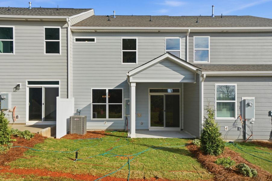 Exterior details and patio area of a home in Blythe Mill Townhomes, Waxhaw (Image 19). Exterior details and patio area of a home in Blythe Mill Townhomes, Waxhaw (Image 19).