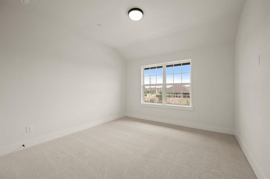 One of two nicely sized secondary bedrooms in our Aurora plan.