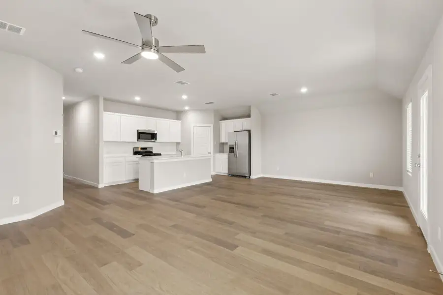 Open Floor Plan in the Emmy II home plan by Trophy Signature Homes - REPRESENTATIVE PHOTO