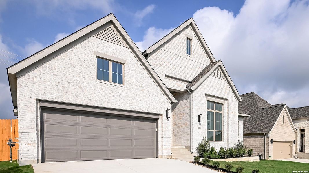 Front exterior of a new home in Cibolo Valley Heights, Cibolo, TX, highlighting curb appeal (Image 1). Front exterior of a new home in Cibolo Valley Heights, Cibolo, TX, highlighting curb appeal (Image 1).