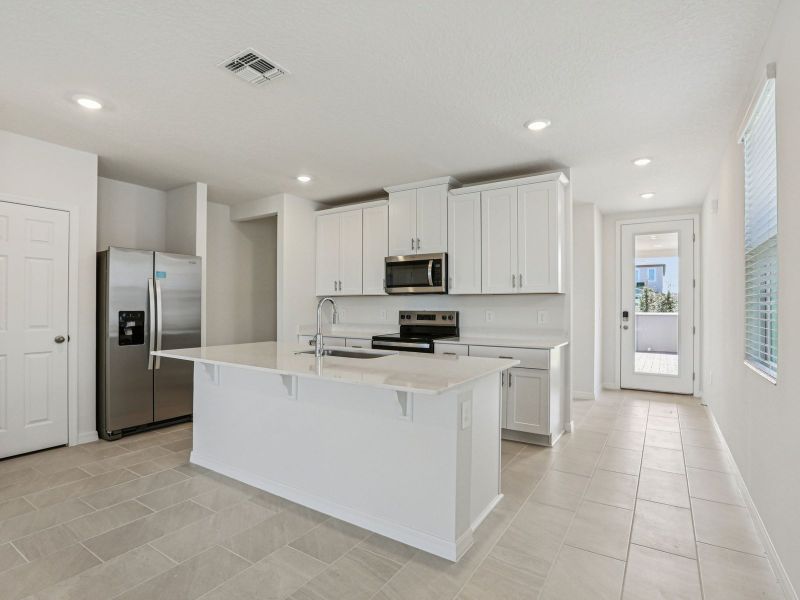 Furnished interior view inside a new home in Springs at Lake Alfred - Classic Series, Lake Alfred (Image 3).