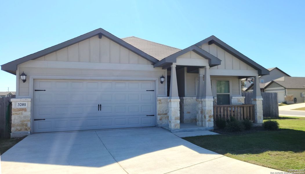 Front exterior of a new home in Catalina, Converse, TX, highlighting curb appeal (Image 2).