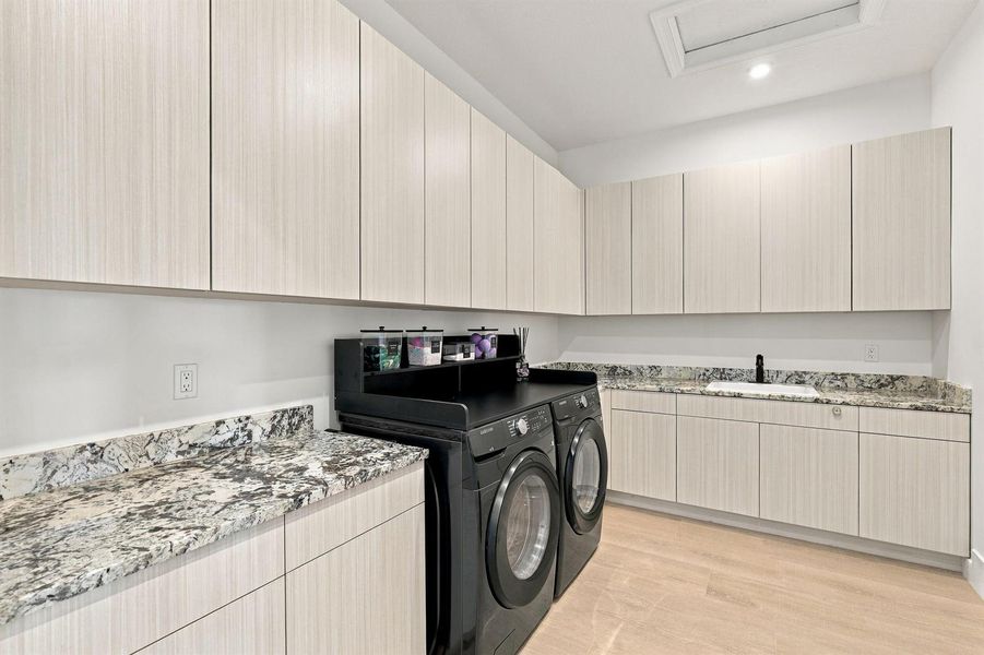 Laundry Room with Ample Cabinetry Laundry Room with Ample Cabinetry
