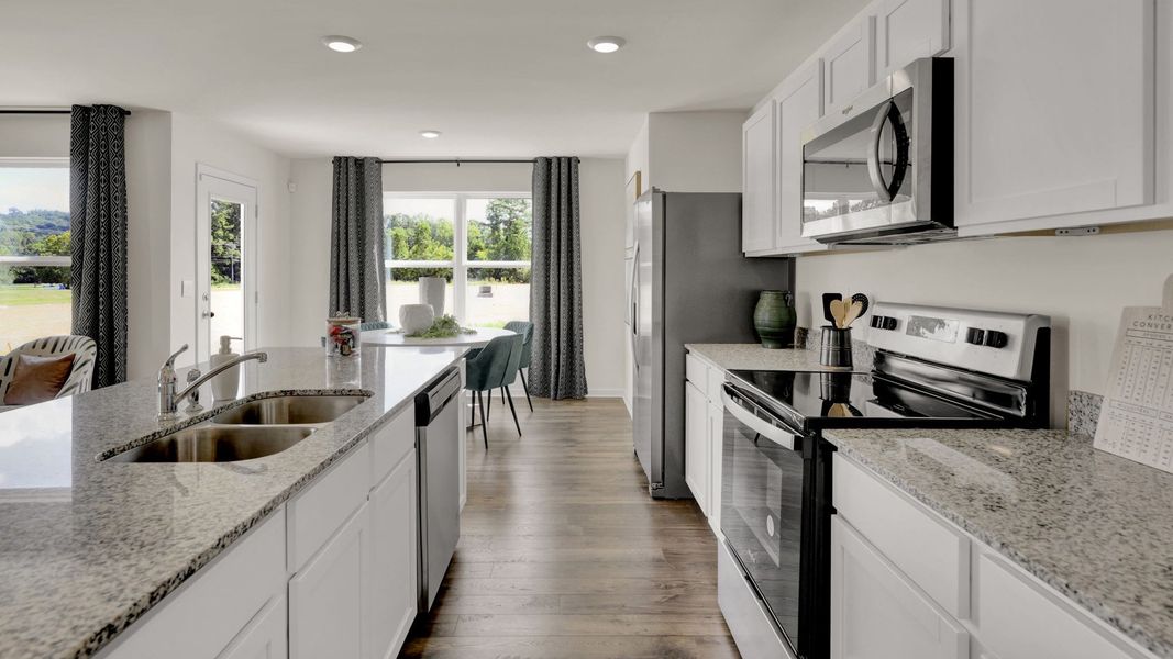 Representative furnished interior of a home built from the Salem by D.R. Horton in Price's Crossing, LaFayette (Image 8).