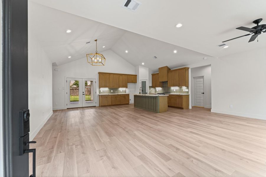 The heart of the home is a beautiful and functional open concept with defined spaces large enough for even oversized furniture.