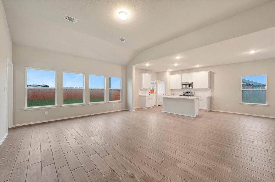 Spacious, unfurnished interior of a new home in Carillon, Manor (Image 12).
