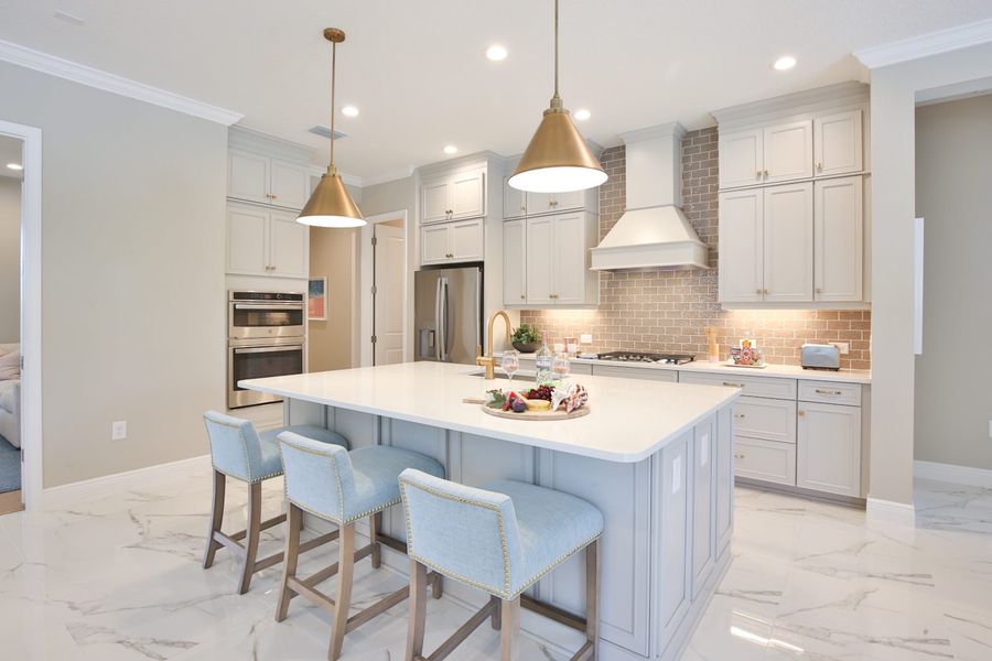 Furnished interior view inside a new home in Boca Royale Golf & Country Club at Wellen Park, Englewood (Image 14).