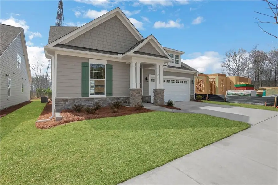 Front exterior of a new home in Marble Tree, Ball Ground, GA, highlighting curb appeal (Image 2).