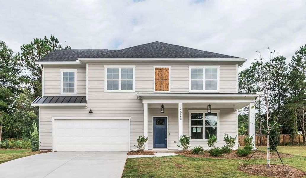 Front exterior of a new home in Creekside, Decatur, GA, highlighting curb appeal (Image 1).