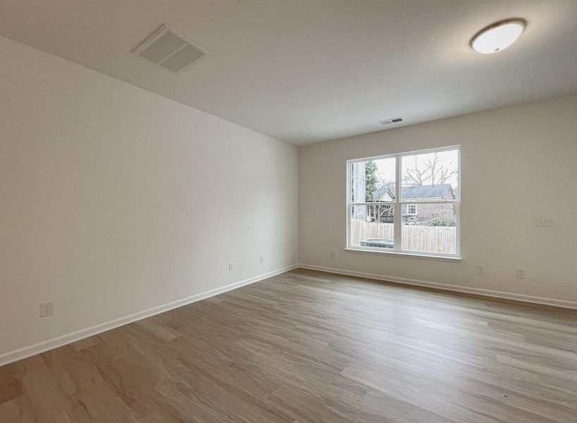Spacious, unfurnished interior of a new home in East Main Townes, Spartanburg (Image 14).