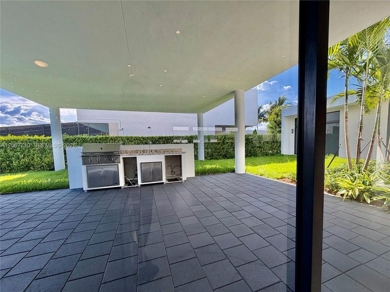 Exterior details and patio area of a home in , Weston (Image 27). Exterior details and patio area of a home in , Weston (Image 27).