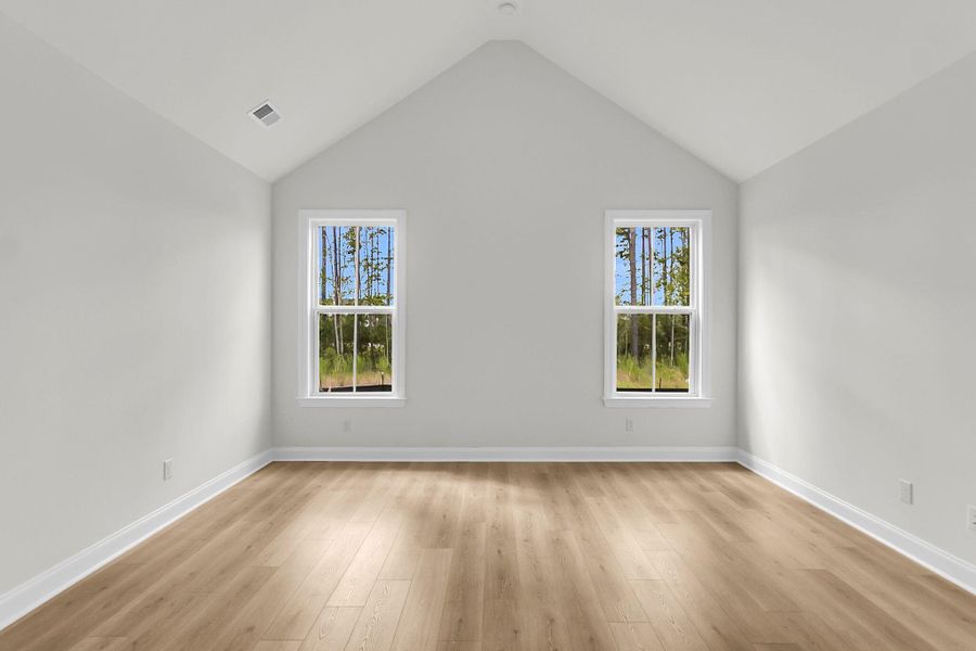 Spacious, unfurnished interior of a new home in Tidewater at Lakes of Cane Bay, Summerville (Image 16).