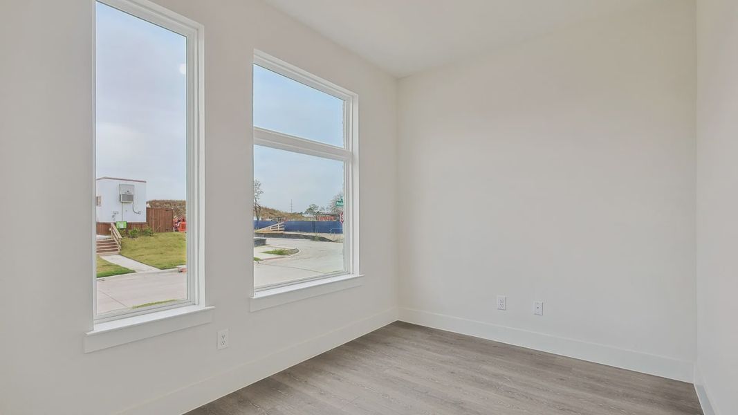Furnished interior view inside a new home in Collin Creek, Plano (Image 25).
