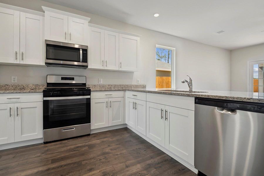 Furnished interior view inside a new home in Sweetwater Ridge, Conroe (Image 7).