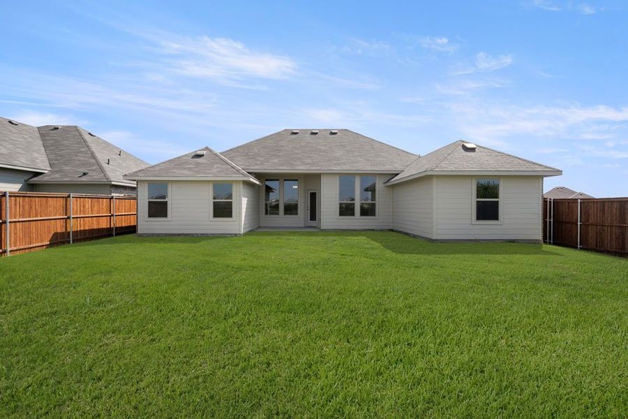 Front exterior of a new home in Still Water Lake, Godley, TX, highlighting curb appeal (Image 14). Front exterior of a new home in Still Water Lake, Godley, TX, highlighting curb appeal (Image 14).