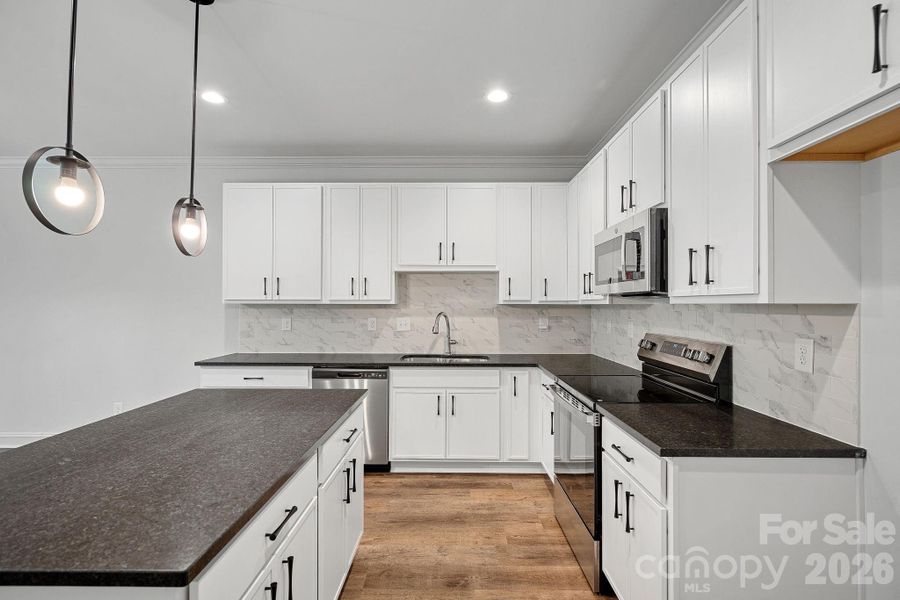 Furnished interior view inside a new home in , Charlotte (Image 6).