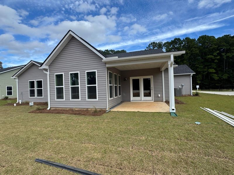 Front exterior of a new home in Central Estates, Summerville, SC, highlighting curb appeal (Image 5).