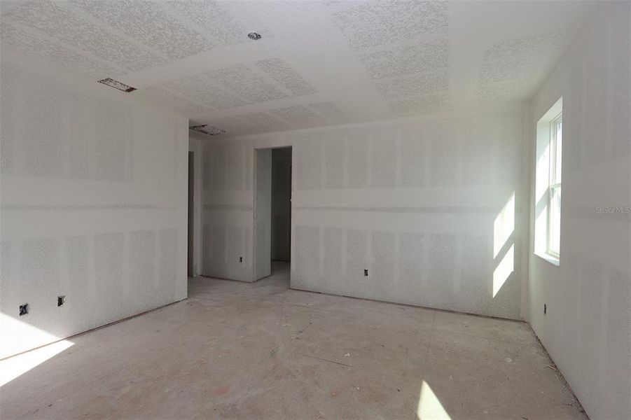 In-progress construction of a new home in Center Lake on the Park, St. Cloud, FL (Image 8).