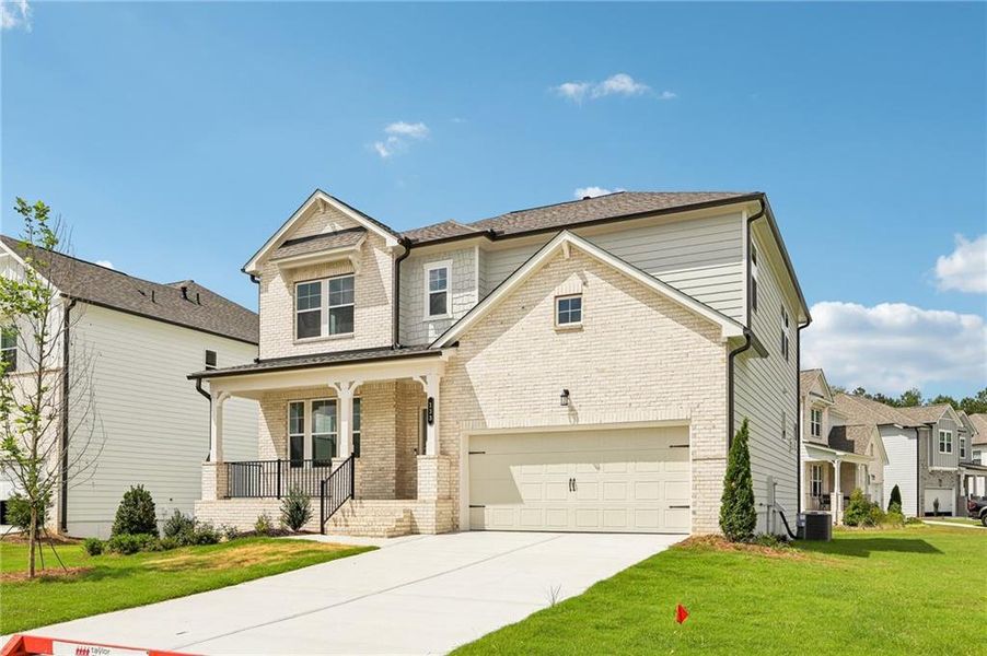 Front exterior of a new home in Bennett Farm, Loganville, GA, highlighting curb appeal (Image 25). Front exterior of a new home in Bennett Farm, Loganville, GA, highlighting curb appeal (Image 25).