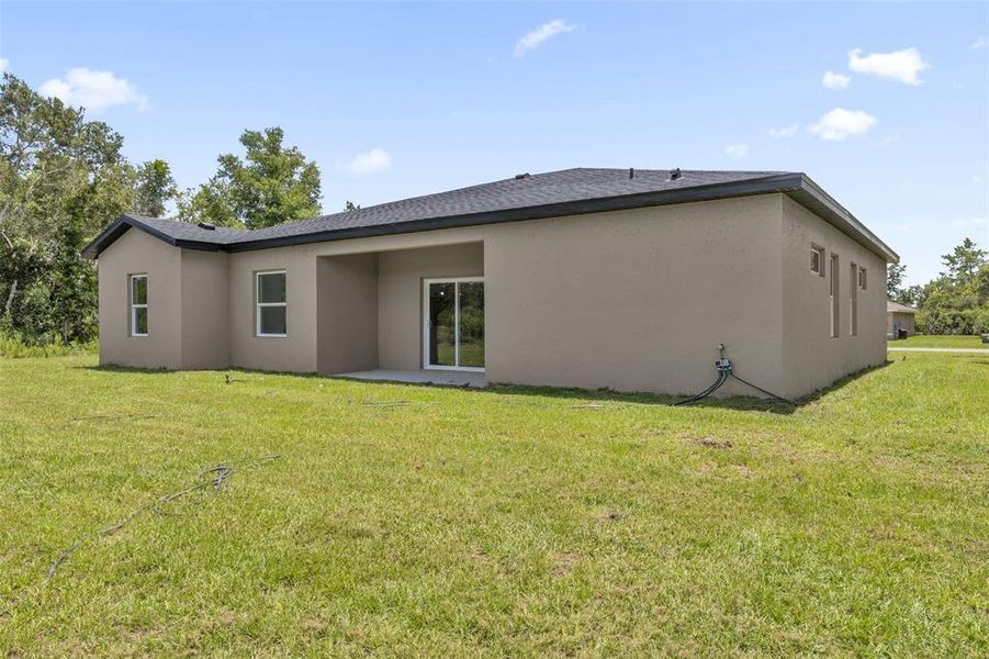 Exterior details and patio area of a home in , Ocala (Image 24).